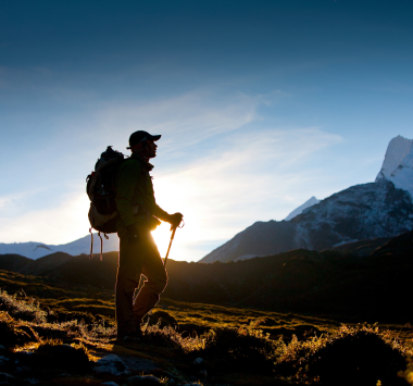 man trekking on mountain area